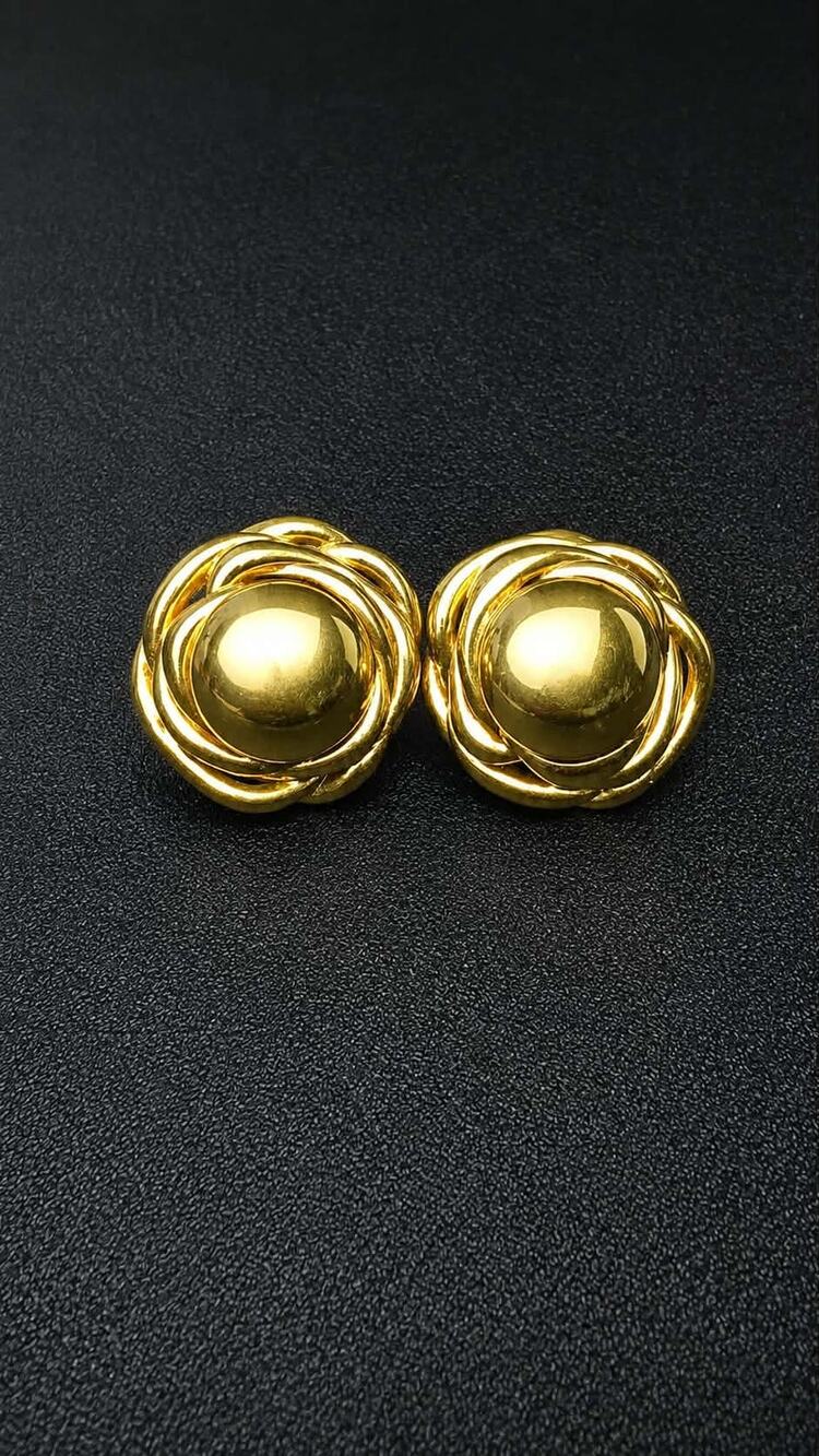 Vintage Monet gold tone knot dome statement stud earrings
